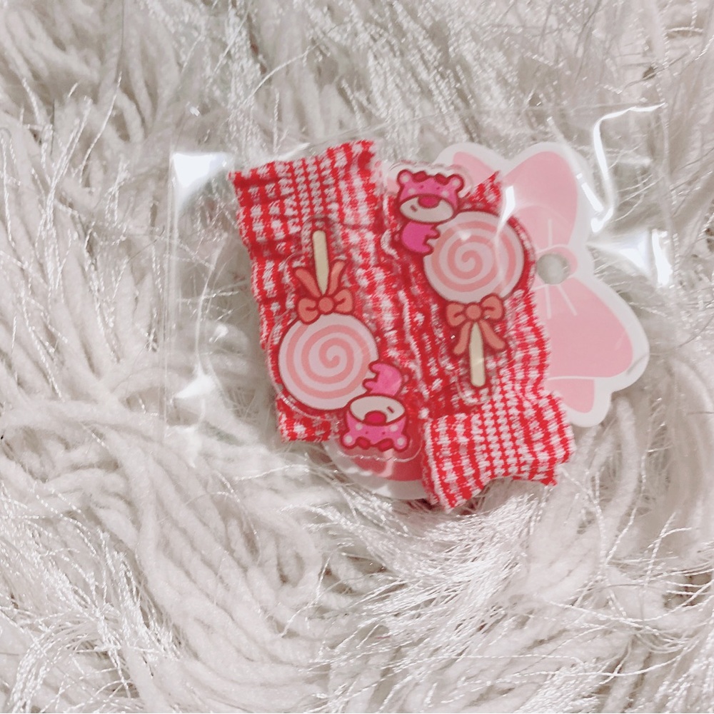 The pink bear from toy story hair clips